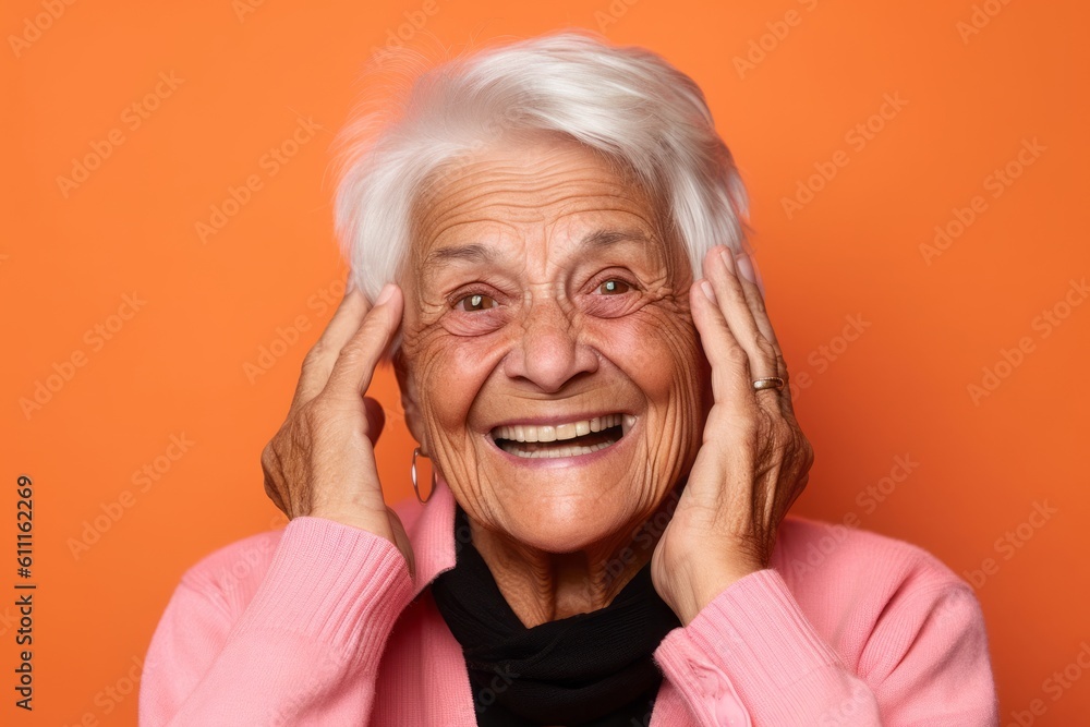 Headshot portrait photography of a happy old woman covering one's ears against a salmon pink background. With generative AI technology Headshot portrait photography of a happy old woman covering one's ears against a salmon pink background. With generative AI technology