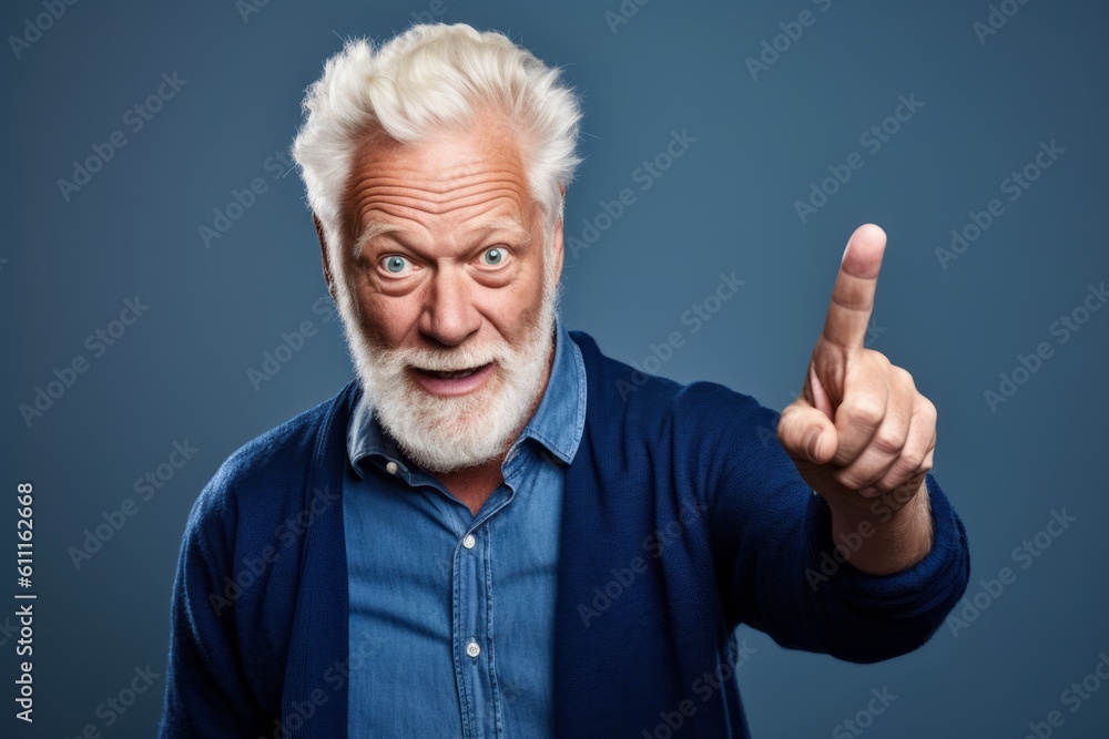 Headshot portrait photography of a glad mature man raising a finger as if having an idea against a soft blue background. With generative AI technology Headshot portrait photography of a glad mature man raising a finger as if having an idea against a soft blue background. With generative AI technology