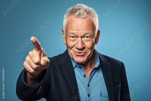 Headshot portrait photography of a glad mature man raising a finger as if having an idea against a soft blue background. With generative AI technology
