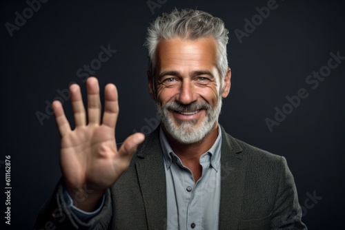 Medium shot portrait photography of a satisfied mature man making a money gesture rubbing the fingers against a dark grey background. With generative AI technology © Markus Schröder
