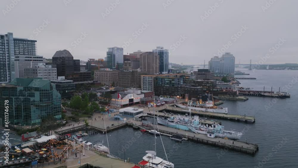 Canada, Halifax, Aerial Drone Shots on Business Center and Pier with Skyscraper in the City Center on a Cinematic Background. Cityscape View of Financial and Residential Buildings on a Cloudy Evening Canada, Halifax, Aerial Drone Shots on Business Center and Pier with Skyscraper in the City Center on a Cinematic Background. Cityscape View of Financial and Residential Buildings on a Cloudy Evening