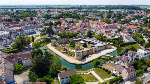 Aerial view of the square-based medieval castle of Brie Comte Robert surrounded with a water-filled moat in the French department of Seine et Marne in the capital region of Ile-de-France near Paris