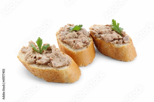 Tasty sandwiches with cod liver and fresh parsley isolated on white