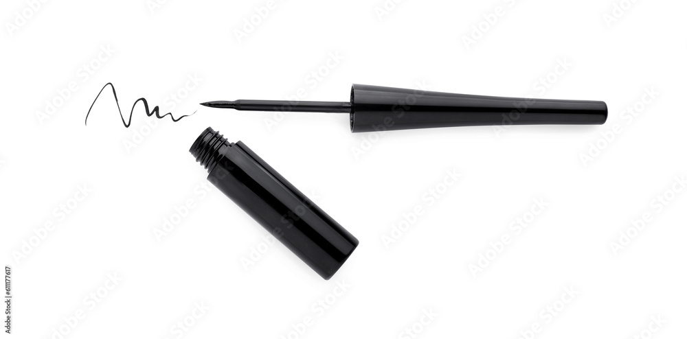 Black eyeliner and stroke on white background, top view. Makeup product