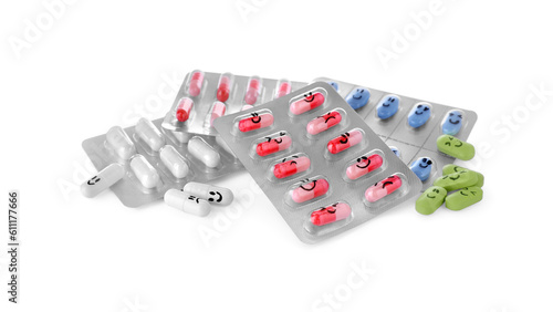 Foto Blisters of different antidepressants with emoticons on white background