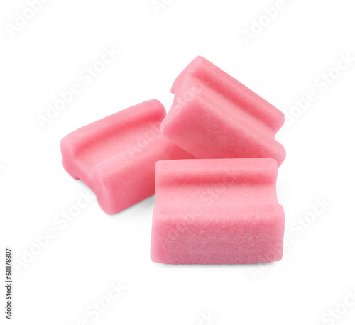 Tasty pink chewing gums on white background