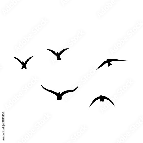 Flying birds silhouettes vector © King Silhouette