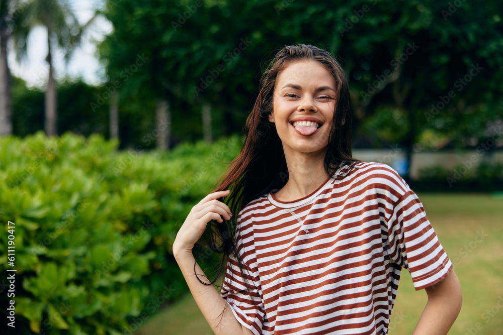 lifestyle woman summer t-shirt smiling sun freedom beautiful nature walk park lifestyle woman summer t-shirt smiling sun freedom beautiful nature walk park