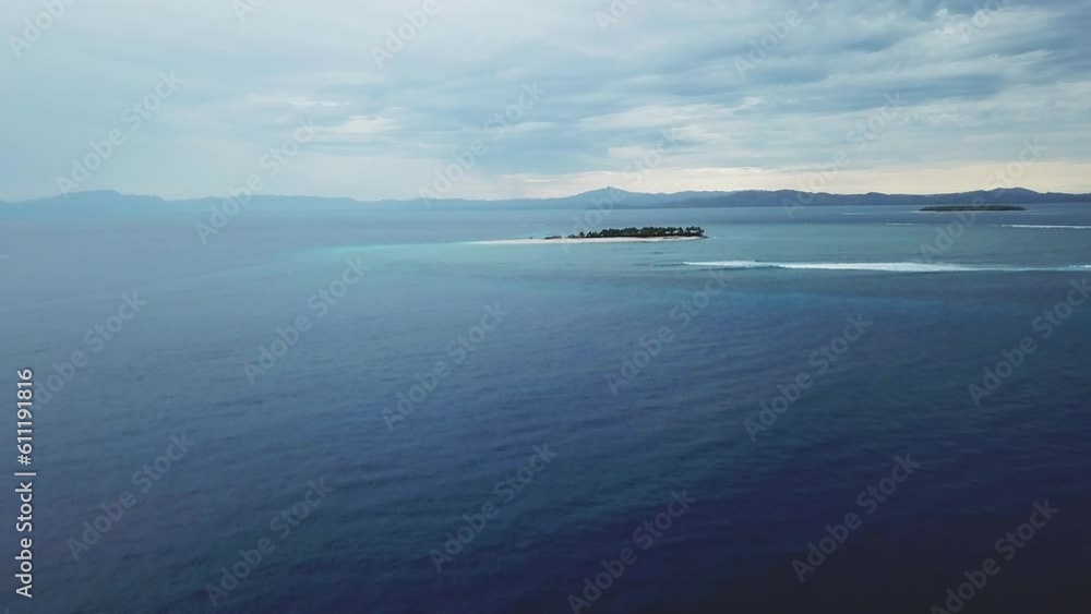 Drone Nadi Fiji Namotu Island Swimming Pools surf wave WSL surfers aerial cinematic over ocean cloudy morning beautiful peaceful relaxing honeymoon adventure resort slowly forward movement Drone Nadi Fiji Namotu Island Swimming Pools surf wave WSL surfers aerial cinematic over ocean cloudy morning beautiful peaceful relaxing honeymoon adventure resort slowly forward movement
