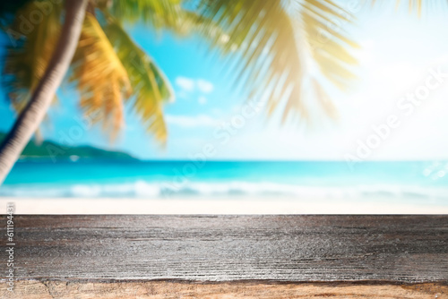 Top of wood table with seascape, blur calm sea and sky at tropical beach background. Empty table ready for your product display montage.