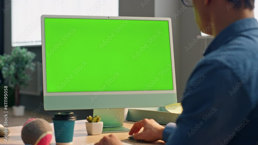 Smart startuper working mockup computer in office closeup. Man staring monitor Smart startuper working mockup computer in office closeup. Man staring monitor