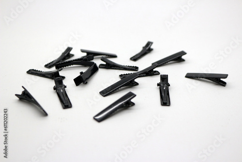Black hair clips scattered