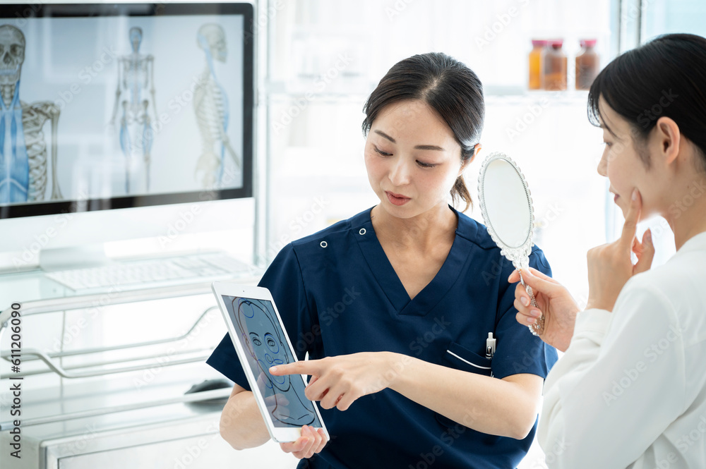 Cosmetic surgeon counseling a patient