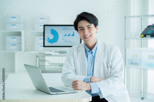 Portrait of a male doctor wearing a white coat
