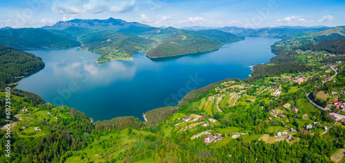 Panorama of Bicaz lake and Ceahlau mountain in Romania, summer landscape © Ioan Panaite