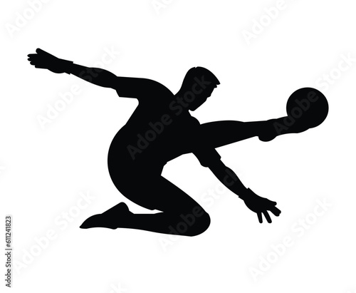 Football goalkeeper silhouette in sports gear kicks the ball with his foot