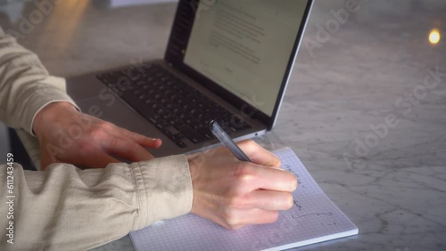 Girl using AI chatbot app on her smartphone to do homework for school assignment and improve her gards. AI revolution in Education from artificial intelligence, generative text in real time photo