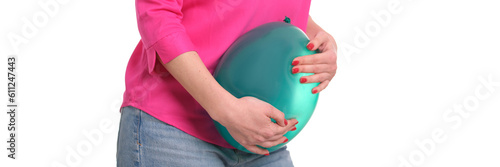 Woman holding on to sick stomach with balloon on white background. Abdominal bloating and flatulence concept