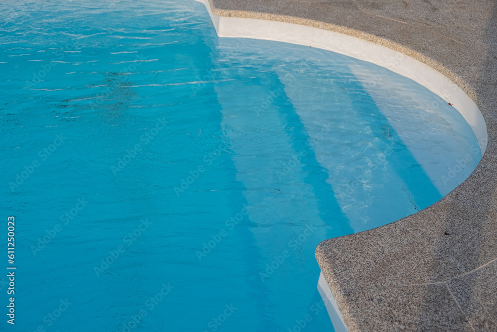 partial view of a pool full of water