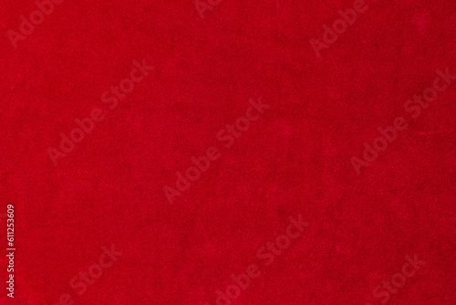 Red velvet fabric texture used as background. red fabric background of soft and smooth textile material. There is space for text..