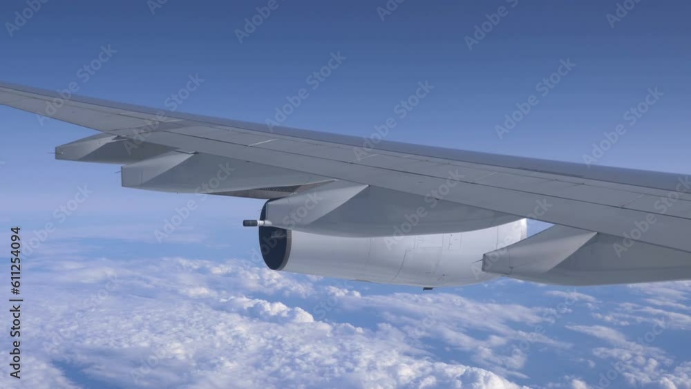 Airplane flight above the clouds in 4K slow motion 60fps Airplane flight above the clouds in 4K slow motion 60fps