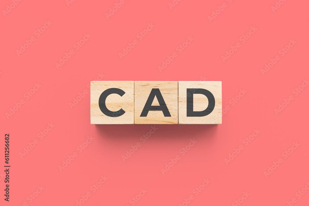 CAD (Coronary Artery Disease) wooden cubes on red background CAD (Coronary Artery Disease) wooden cubes on red background