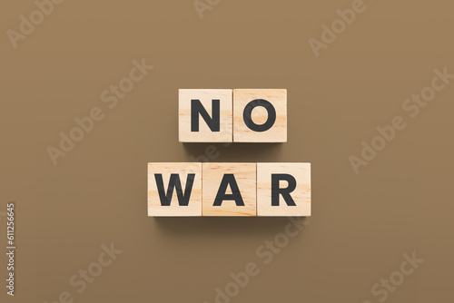 No War wooden cubes on brown background