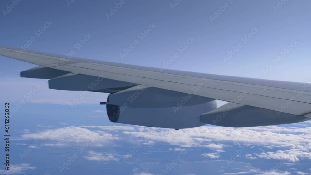 Airplane flight above the clouds in 4K slow motion 60fps Airplane flight above the clouds in 4K slow motion 60fps