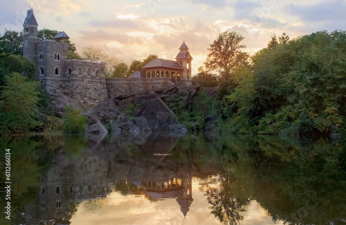  summer castle and water with sunset in central park backlit 