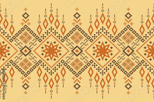 Yellow vintages cross stitch traditional ethnic pattern paisley flower Ikat background abstract Aztec African Indonesian Indian seamless pattern for fabric print cloth dress carpet curtains and sarong