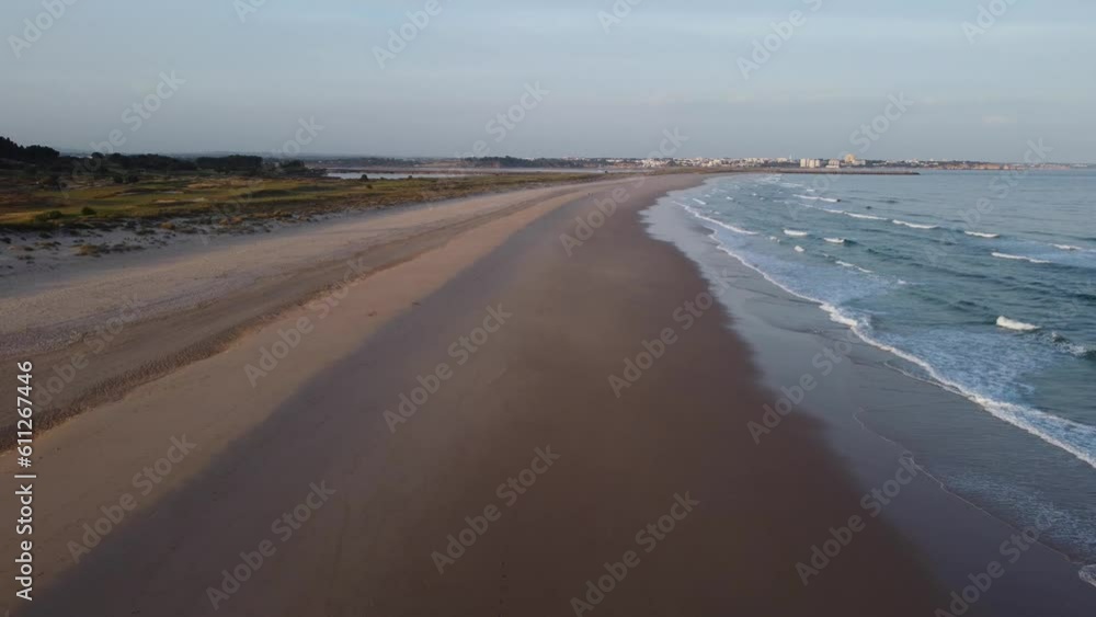 Aerial shoot by drone, flying over a beach at Algarve, Portugal.