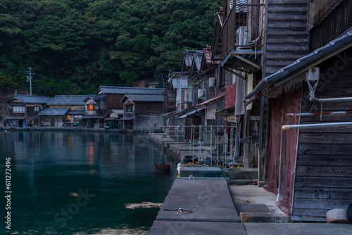 Night view of traditional boathouses at Ine Town in Kyoto, Japan.