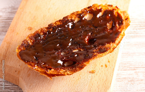 Slice of toast bread with marmite photo