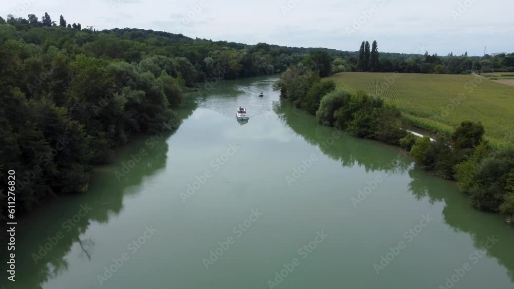 Aerial shoot by drone, boats sailing in the river, France Aerial shoot by drone, boats sailing in the river, France
