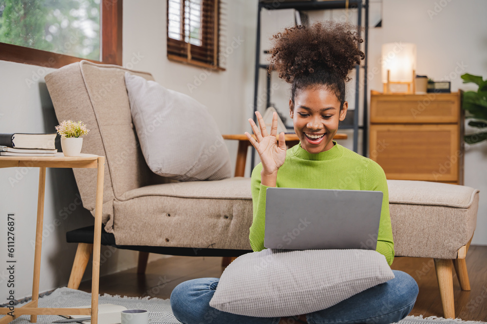 African American woman working at her home. girl studying online African American woman working at her home. girl studying online