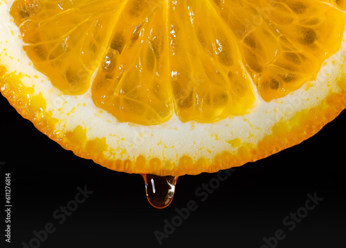 An orange, sliced and dripp...