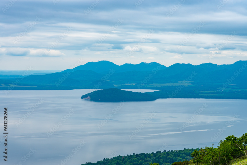 Naklejka premium Lake Kussharo in summer season sunny day. Natural landscape from Bihoro-toge pass lookout view point. Akan Mashu National Park, Hokkaido, Japan