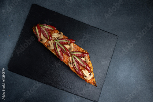 Polish fast food casserole on a dark background photo