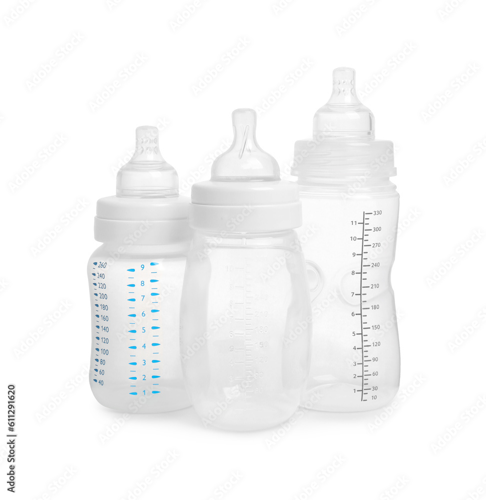 Three empty feeding bottles for baby milk on white background Three empty feeding bottles for baby milk on white background
