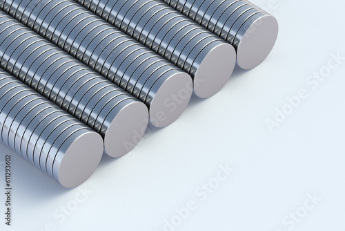 Many neodymium magnets on white background. Copy space. 3d render photo