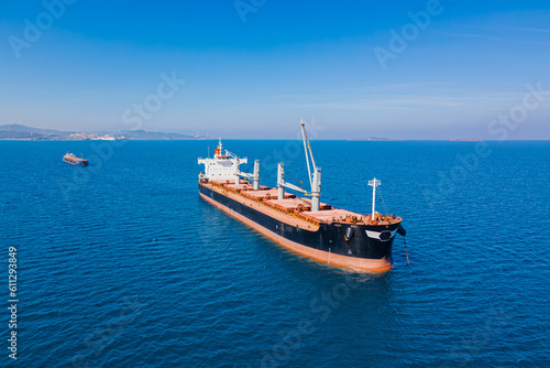 Aerial view of Dry bulk cargo ship in anchorage near commercial port