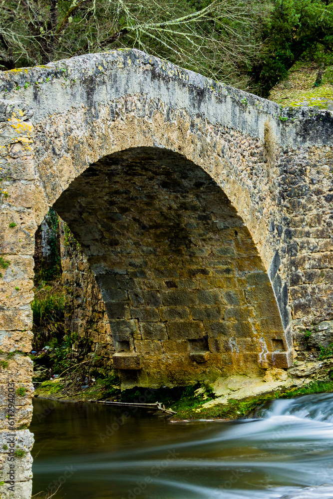 old stone bridge over the river