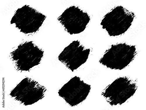 Set of black abstract brush strokes. Ink stain isolated on white background. Grainy textured design elements. Vector illustration  eps 10.