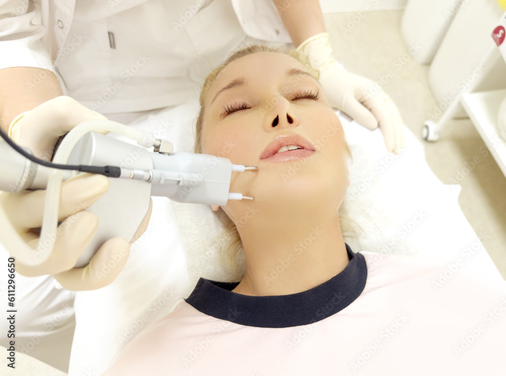 Fototapeta premium Laser Treatment,Cosmetic Laser Dermatology ,dermatologist offices,laser technology