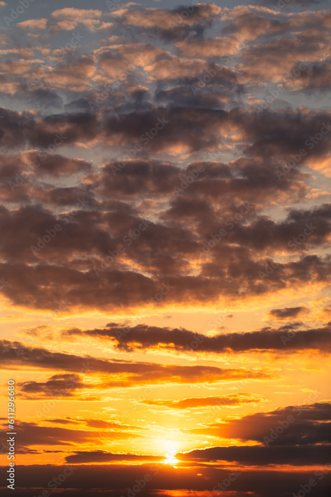 Glowing Horizon: Sun-kissed Clouds at Dusk or dawn