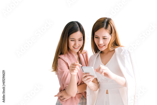Two Asian business women looking at the smartphone screen using smart phone for online shopping, internet. isolated white background, remove background