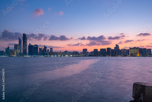 Sunrise high rise building of hotel, offices in Abu Dhabi capital, United Arab Emirates