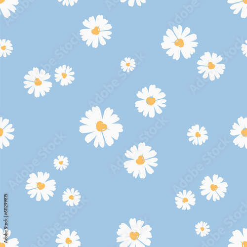Seamless pattern with daisy flower with heart shape pollen on blue background vector illustration. Cute floral print.