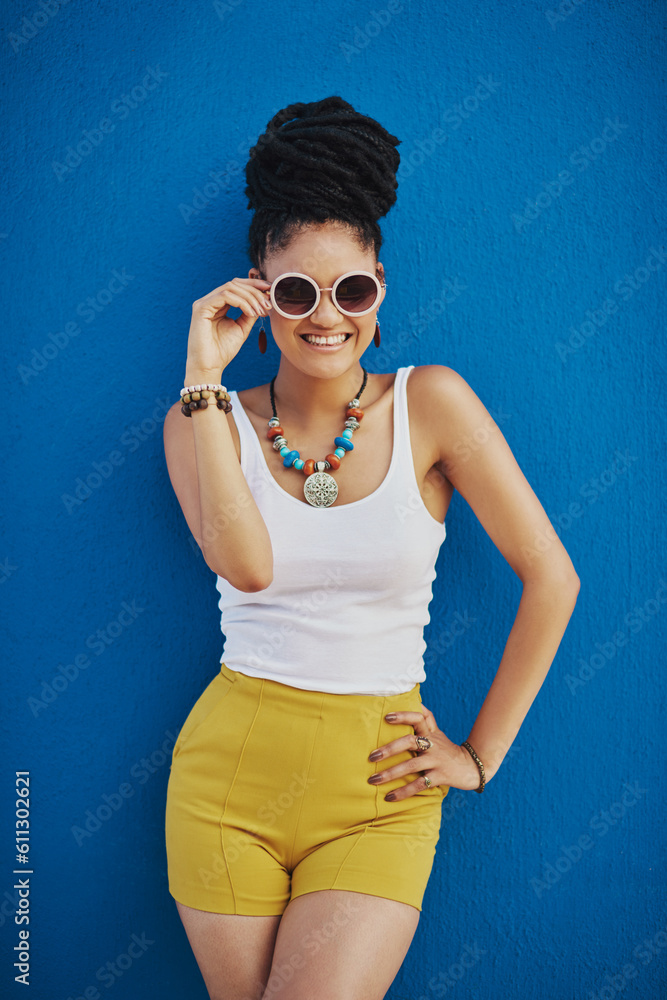 Fashion, portrait and woman with sunglasses on blue background, wall and summer streetwear, trendy clothes or shades mockup. Girl, happy and excited model with cool style, vision and urban mock up