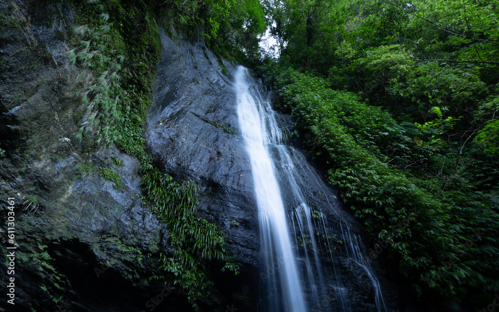 Rainbow waterfall is a tall waterfall in the dense jungle of Taiwan Rainbow waterfall is a tall waterfall in the dense jungle of Taiwan